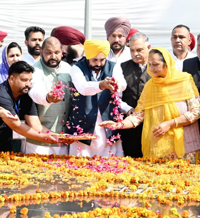 Pays floral tribute to the martyr at his native village